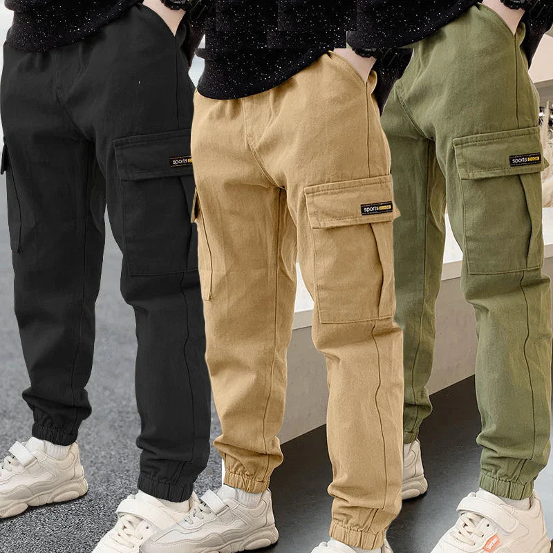 Casual spring autumn boys pants in solid color with zipper fly and pockets, suitable for ages 3-12, sporty outdoor trousers
